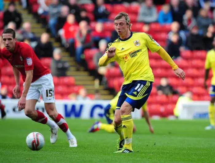 Framed Print : Martyn Woolford Slides for Bristol City in Barnsley Championship Clash, October 2011 Framed Print : Martyn Woolford Slides for Bristol City in Barnsley Championship Clash, October 2011