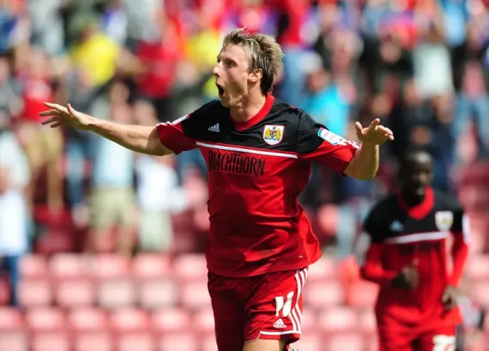 Framed Print : Martyn Woolford's Double: Bristol City's Championship Victory Over Cardiff City (August 25, 2012)