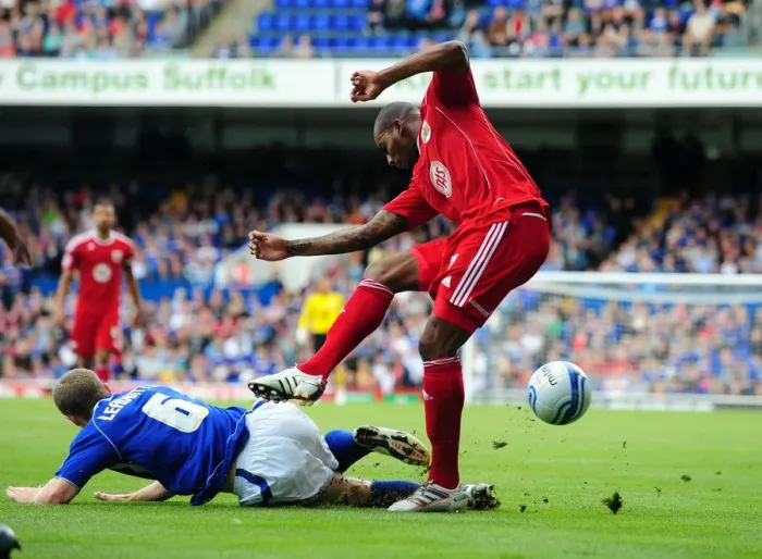Framed Print : Marvin Elliott vs Grant Leadbitter: Intense Tackle in Championship Clash between Ipswich and Bristol City (August 2010) Framed Print : Marvin Elliott vs Grant Leadbitter: Intense Tackle in Championship Clash between Ipswich and Bristol City (August 2010)