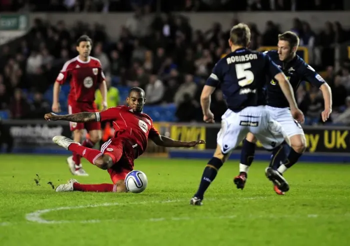 Framed Print : Marvin Elliott's Sliding Effort: Millwall vs. Bristol City, Championship 2011