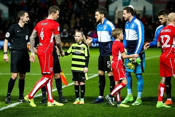 Mascots Face Off: Bristol City vs. Huddersfield Town in Sky Bet EFL Championship Match, Ashton Gate