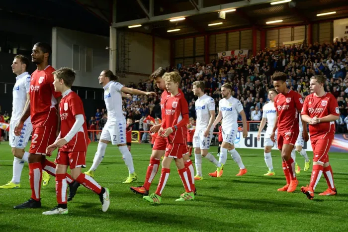 Framed Print : Mascots Lead the Way: Bristol City vs Leeds United at Ashton Gate Stadium