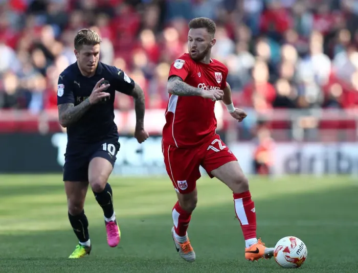Framed Print : Matt Taylor Dodges George Moncur: Thrilling Moment from Bristol City vs Barnsley Championship Clash Framed Print : Matt Taylor Dodges George Moncur: Thrilling Moment from Bristol City vs Barnsley Championship Clash