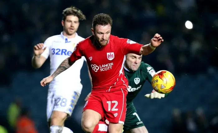 Framed Print : Matty Taylor Outmuscles Robert Green: A Pivotal Moment in Leeds United vs. Bristol City, 2017