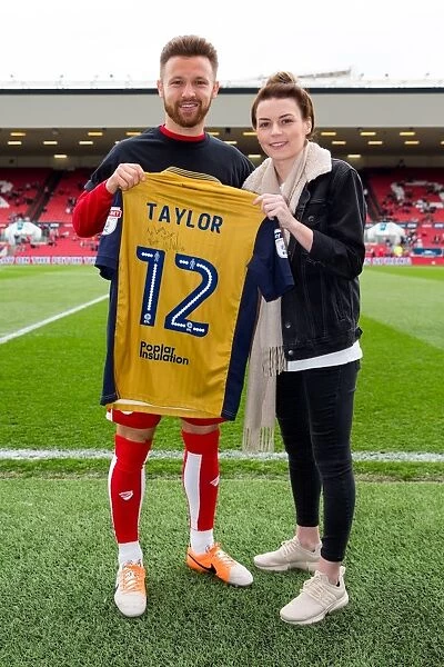 Matty Taylor's Promise: Fan's Social Media Victory Rewarded with Signed Shirt by Bristol City Star