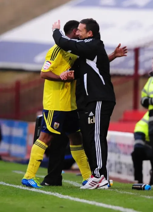 Framed Print : McInnes First Win: Embracing Maynard's Championship Goal (2011) Framed Print : McInnes First Win: Embracing Maynard's Championship Goal (2011)