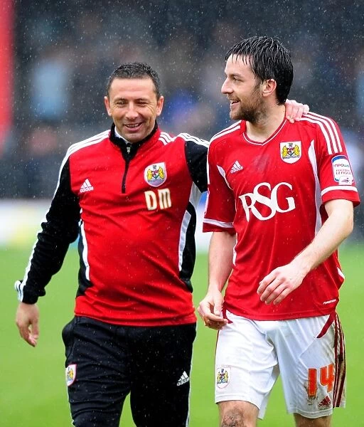 McInnes Triumphant Moment with Skuse: Bristol City's Victory Over Coventry City, April 9, 2012