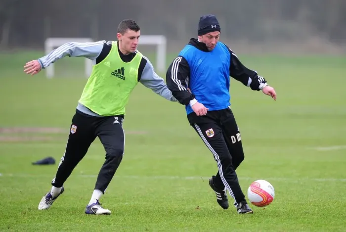 Framed Print : McInnes vs. Wilson: A Training Showdown at Memorial Stadium - Derek McInnes and James Wilson Lock Horns during Bristol City FC Training Framed Print : McInnes vs. Wilson: A Training Showdown at Memorial Stadium - Derek McInnes and James Wilson Lock Horns during Bristol City FC Training