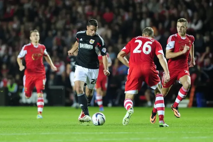 Framed Print : McLaughlin's Charging Run: A Pivotal Moment in Southampton vs. Bristol City Football Showdown