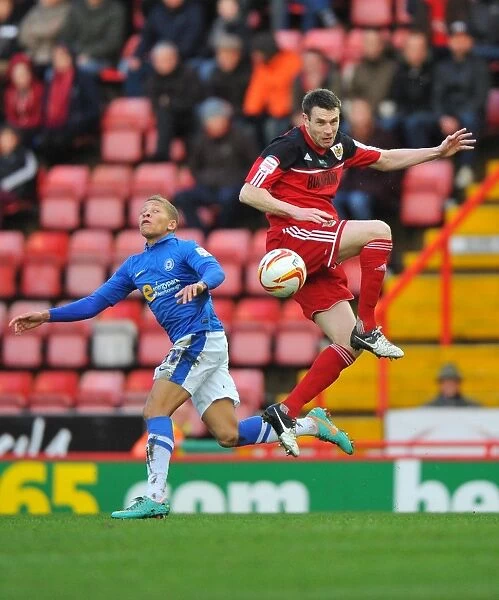 McManus vs Gayle: Aerial Battle in Championship Football - Bristol City vs Peterborough United