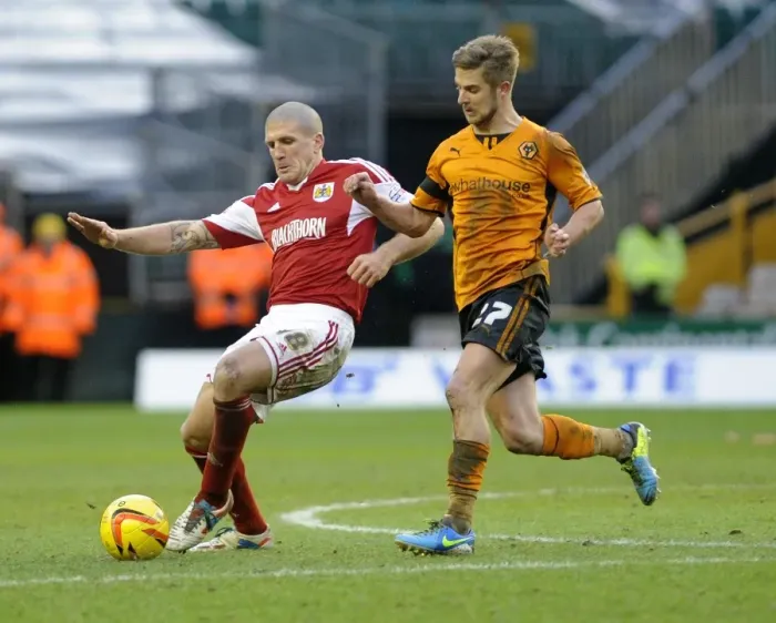 Framed Print : Michael Jacobs vs Adam El-Abd: Intense Battle for the Ball in Wolverhampton Wanderers vs Bristol City (25 / 01 / 2014) Framed Print : Michael Jacobs vs Adam El-Abd: Intense Battle for the Ball in Wolverhampton Wanderers vs Bristol City (25 / 01 / 2014)