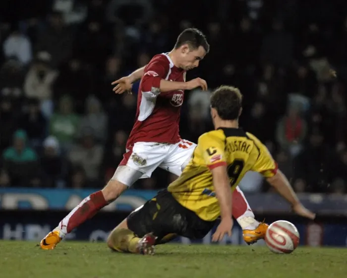 Framed Print : Michael McIndoe in Action: Bristol City vs. Watford - Intense Football Showdown