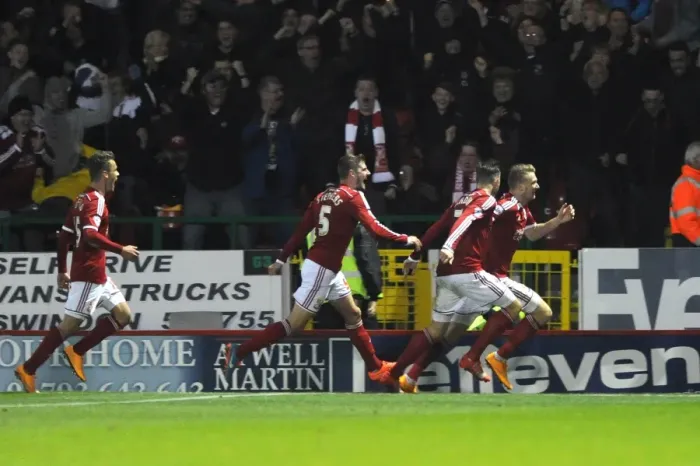 Framed Print : Michael Smith's Thrilling Goal Celebration: Swindon Town vs. Bristol City (November 15, 2014) Framed Print : Michael Smith's Thrilling Goal Celebration: Swindon Town vs. Bristol City (November 15, 2014)