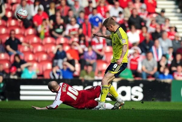 Middlesbrough's Nicky Bailey Tackles Jon Stead of Bristol City - Football Rivalry at Riverside Stadium (March 2012)