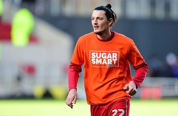 Milan Djuric of Bristol City Warms Up in Sugar Smart T-Shirt Ahead of Sky Bet Championship Match vs. Cardiff City (January 14, 2017)