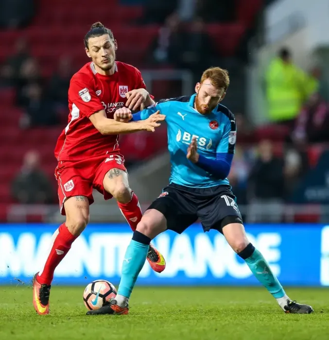 Framed Print : Milan Djuric vs Cian Bolger: Intense Battle at Ashton Gate, FA Cup Third Round (Bristol City v Fleetwood Town)