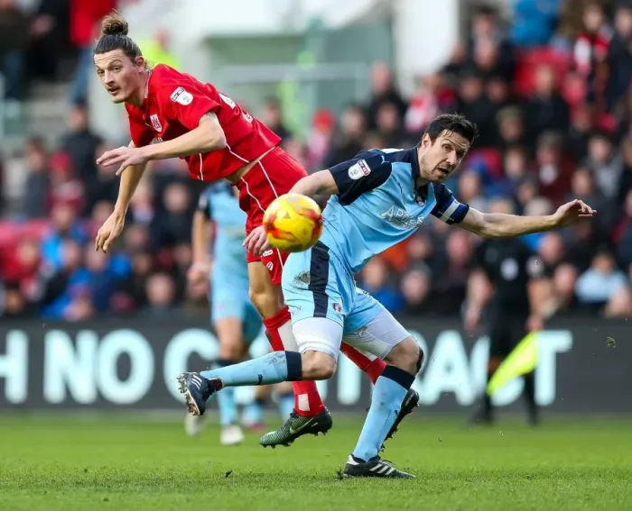 Framed Print : Milan Djuric vs Richard Wood: Intense Clash in Bristol City vs Rotherham United Championship Match