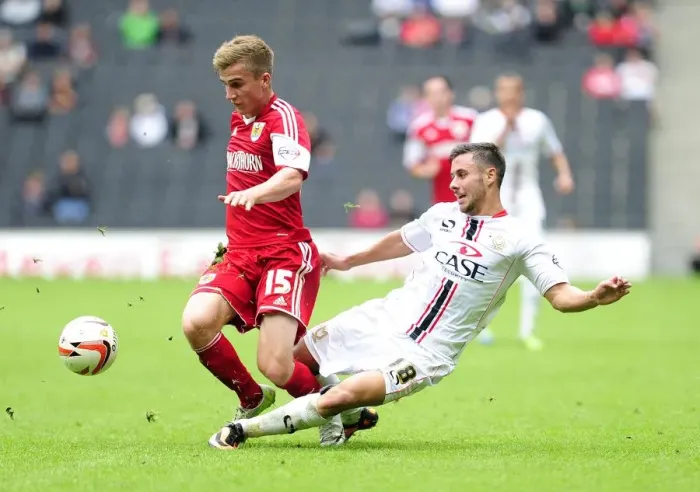 Framed Print : Milton Keynes Dons George Baldock Fouls Joe Bryan in Milton Keynes Dons vs. Bristol City Football Match, Sky Bet League One (August 24, 2013)