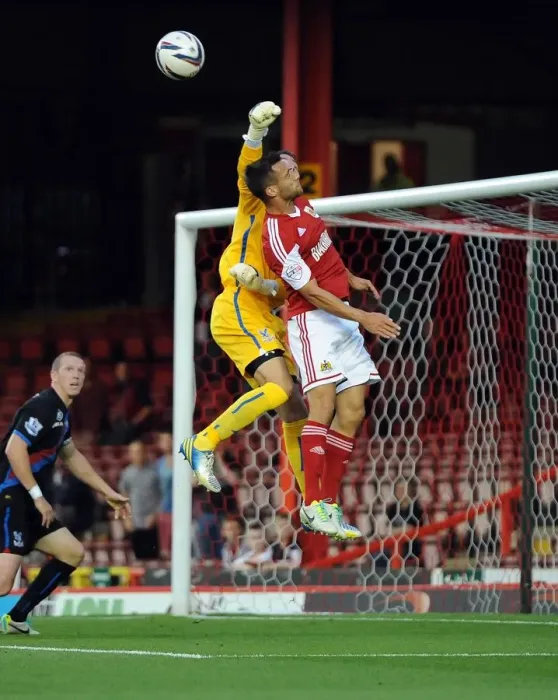 Framed Print : Neil Alexander vs Sam Baldock: Intense Moment at Ashton Gate - Bristol City vs Crystal Palace, 2013