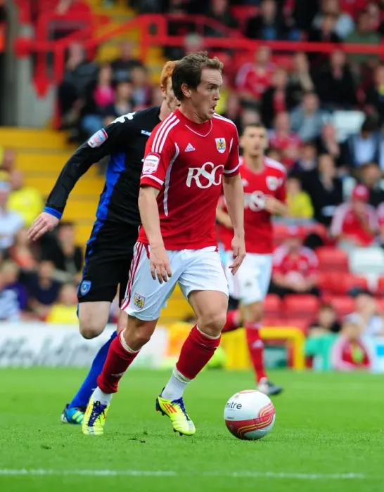 Framed Print : Neil Kilkenny in Action: Bristol City vs. Portsmouth, Championship Clash at Ashton Gate Stadium (2011)