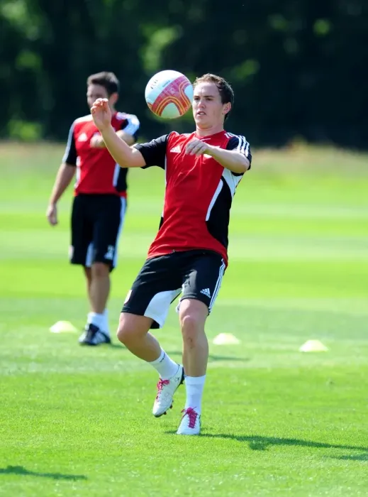 Framed Print : Neil Kilkenny: Bracing for Bristol City's Pre-Season Training Framed Print : Neil Kilkenny: Bracing for Bristol City's Pre-Season Training
