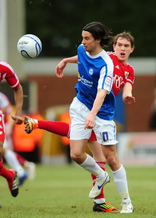 Framed Print : Neil Kilkenny vs George Boyd: Battle for the Ball in Peterborough United vs Bristol City Football Match, 2012