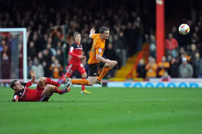 Framed Print : Neil Kilkenny vs. Kevin Foley: Intense Championship Showdown at Ashton Gate