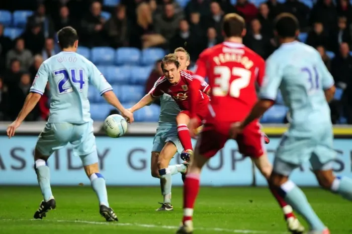 Framed Print : Neil Kilkenny's Shot Blocked in Coventry City vs. Bristol City Championship Match, December 2011