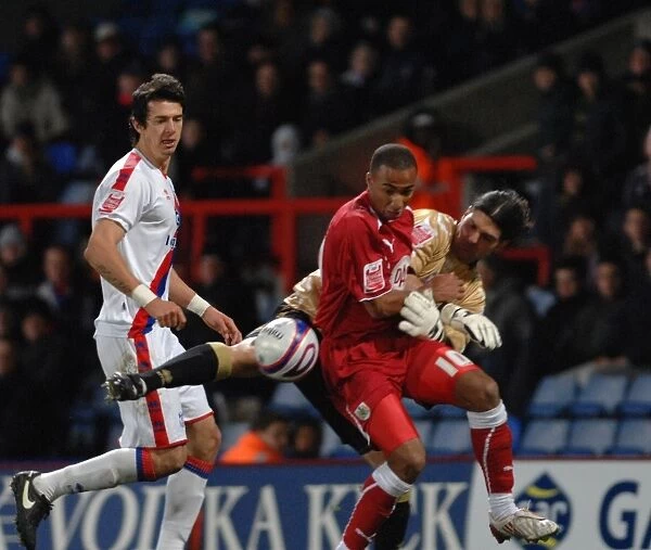 Nicky Maynard battles for the ball with Juilian Speroni