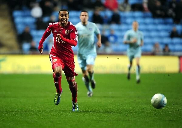Nicky Maynard Chases Loose Ball in Coventry City vs. Bristol City Championship Match, 26 / 12 / 2011