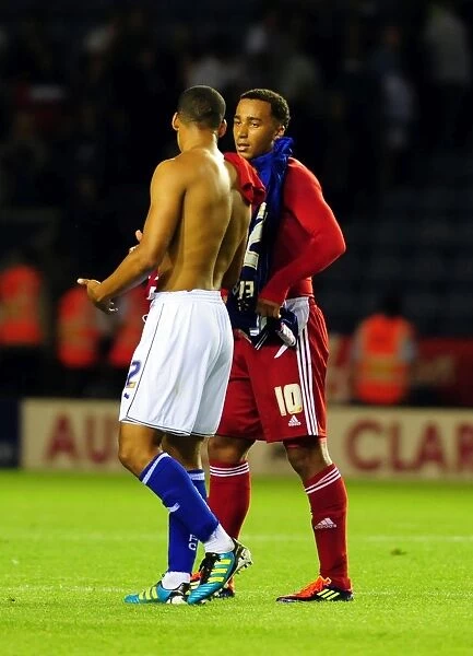 Nicky Maynard and Lee Peltier Exchange Shirts: Leicester City vs. Bristol City, Championship Match, August 2011