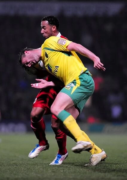 Nicky Maynard vs. Elliott Ward: Battle for the Ball in Norwich City vs. Bristol City Championship Clash (14 / 03 / 2011)