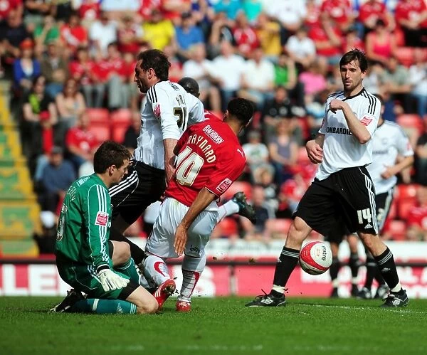 Nicky Maynard's Thwarted Goal: Derby County's Saul Deeney Saves at Ashton Gate, 2010 Championship Match