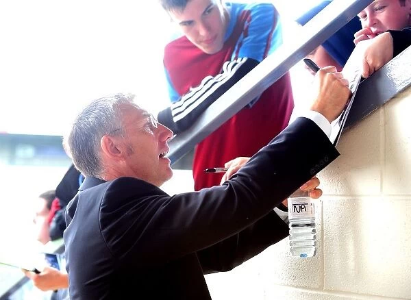Nigel Adkins of Scunthorpe United Signs Autographs During Bristol City Championship Clash at Glanford Park, 2010