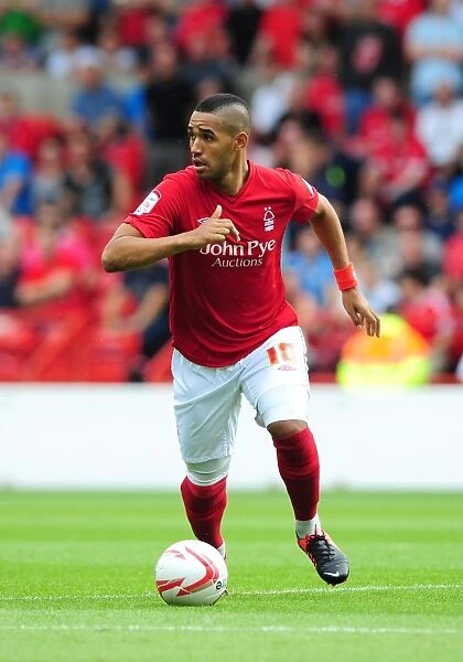 Nottingham Forest vs. Bristol City: Lewis McGugan in Action at The City Ground (Championship Football Match)