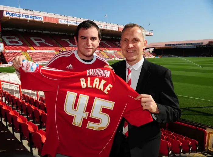Framed Print : NPower super fan Dan Blake is presented with a shirt bt Bristol City Manager, Keith Milen Framed Print : NPower super fan Dan Blake is presented with a shirt bt Bristol City Manager, Keith Milen