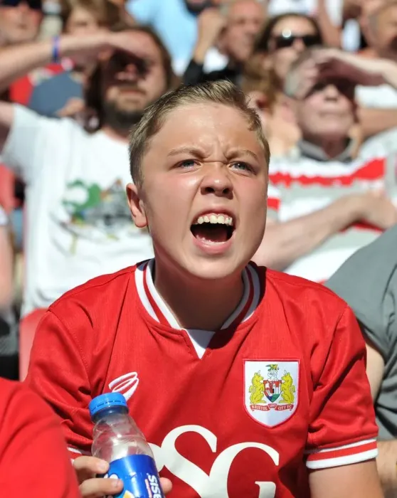 Framed Print : A Passionate Bristol City Fan Cheers in the Dolman Stand during the Sky Bet Championship Match against Wigan Athletic Framed Print : A Passionate Bristol City Fan Cheers in the Dolman Stand during the Sky Bet Championship Match against Wigan Athletic