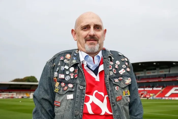 Framed Print : A Passionate Bristol City Fan Displays His Pin Badge Collection at Fleetwood Town Match Framed Print : A Passionate Bristol City Fan Displays His Pin Badge Collection at Fleetwood Town Match