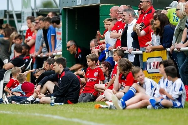 Passionate Bristol City FC Fans in Action at Hengrove Athletic Pre-Season Match