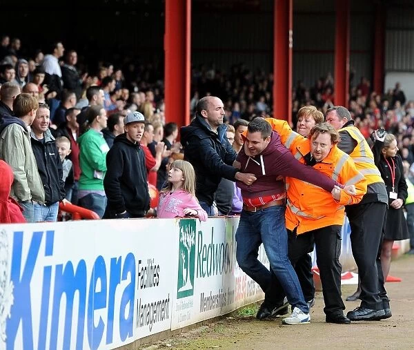 Passionate East End Fans: Intense Moments at Bristol City vs Crewe, 2014