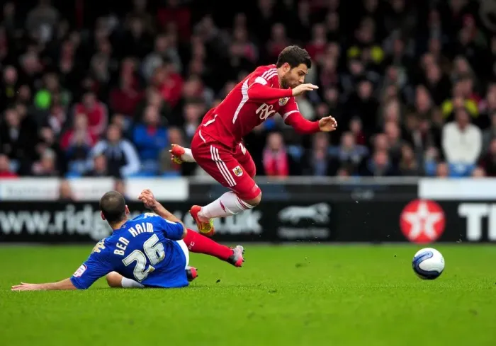 Framed Print : Portsmouth vs. Bristol City: Aaron Hollaway Foul by Tal Ben Haim Framed Print : Portsmouth vs. Bristol City: Aaron Hollaway Foul by Tal Ben Haim