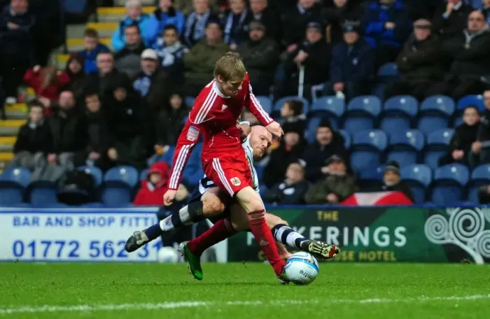 Framed Print : Preston's Wayne Brown Fouls Bristol City's Andy Keogh during Championship Match Framed Print : Preston's Wayne Brown Fouls Bristol City's Andy Keogh during Championship Match