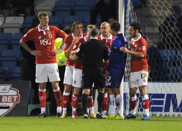 Framed Print : Protesting the Penalty: Bristol City Players Show Disagreement at Priestfield Stadium Framed Print : Protesting the Penalty: Bristol City Players Show Disagreement at Priestfield Stadium