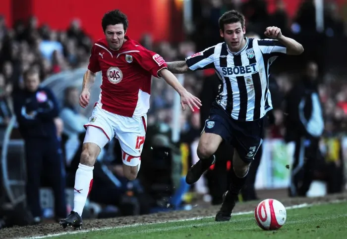 Framed Print : Race for the Ball: Ivan Sproule vs. Joe Mattock in Bristol City vs. West Bromwich Albion Football Championship Clash