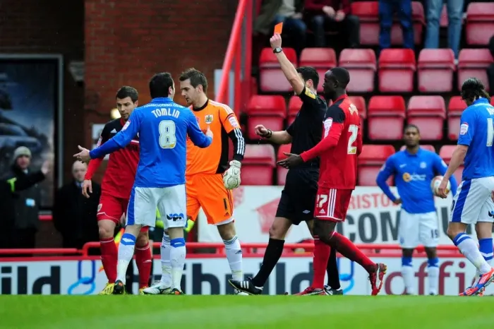 Framed Print : Referee Sends Off Lee Tomlin in Intense Bristol City vs. Peterborough United Championship Clash Framed Print : Referee Sends Off Lee Tomlin in Intense Bristol City vs. Peterborough United Championship Clash