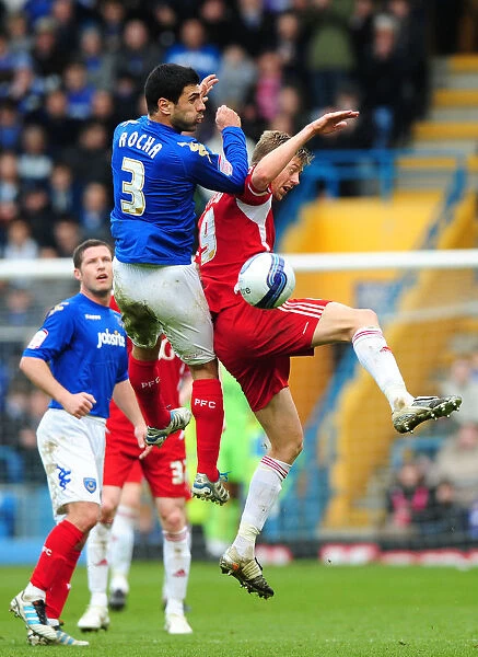 Rocha vs Stead: Aerial Battle at Fratton Park - Portsmouth vs Bristol City Football Match, March 17, 2012