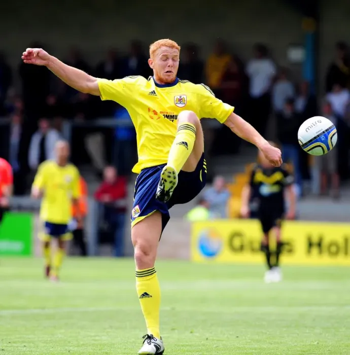 Framed Print : Ryan Taylor in Action: Torquay vs. Bristol City Football Match Framed Print : Ryan Taylor in Action: Torquay vs. Bristol City Football Match