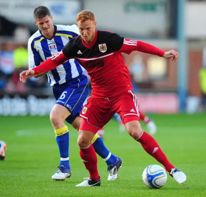 Framed Print : Ryan Taylor Charges Forward in Pre-Season Action: Bristol City's Midfielder Makes His Move