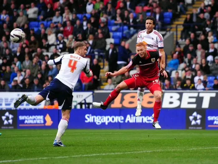 Framed Print : Ryan Taylor's Header: A Pivotal Moment in the 2010-11 Championship Clash Between Bolton Wanderers and Bristol City