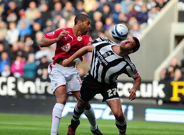 Saborio vs. Taylor: Intense Moment from Newcastle United vs. Bristol City Football Match
